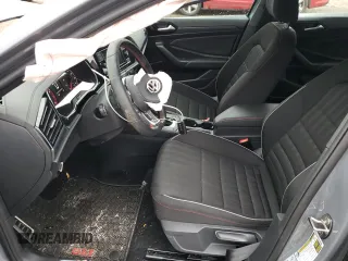 2021 Volkswagen Jetta GLI S z VIN 3VW6T7BU1MM017433, wystawiony jako Copart lot #73349822 z przebiegiem 7188 mil mil oraz . Historia ofert i sprzedaży dostępna na DreamBid. Obrazek 7.
