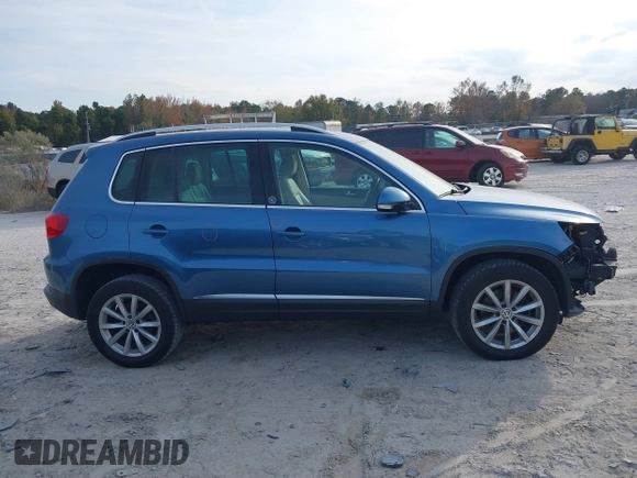 2017 Volkswagen Tiguan Wolfsburg Edition with VIN WVGRV7AX6HW504313, listed as a IAAI auction lot 40950812 with 149,884 mi miles and . Bid and sale history available at DreamBid. Image 13.