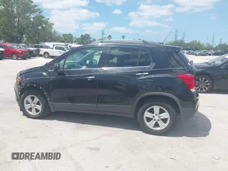 2018 Chevrolet Trax LT with VIN 3GNCJLSB9JL276974, listed as a IAAI auction lot 41959303 with 59,686 mi miles and . Bid and sale history available at carsss.com. Image 14.