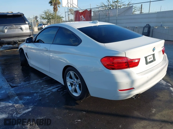 2014 BMW 4 Series 428i with VIN WBA3N7C50EF718812, listed as a IAAI auction lot 41349128 with 67,581 mi miles and . Bid and sale history available at carsss.com. Image 3.