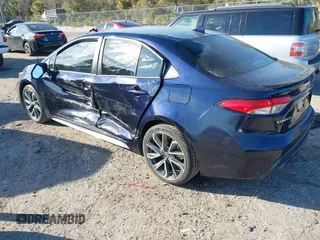 2021 Toyota Corolla SE with VIN 5YFS4MCE3MP063746, listed as a IAAI auction lot 41472956 with 72,199 mi miles. Bid and sale history available at carsss.com. Image 3.