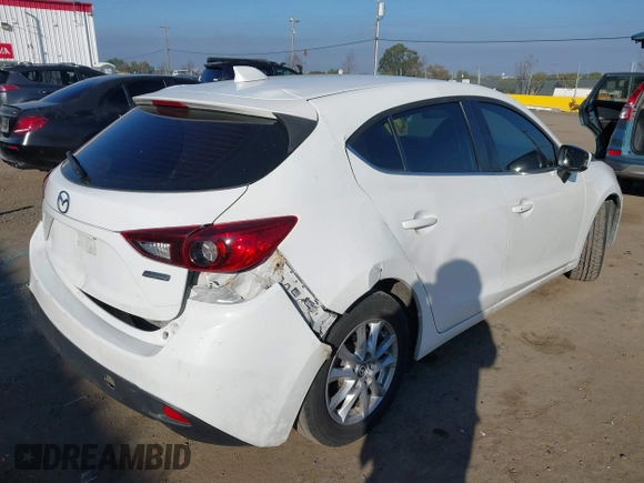 2014 Mazda 3 i Grand Touring with VIN JM1BM1M7XE1102093, listed as a IAAI auction lot 41344433 with 148,395 mi miles and . Bid and sale history available at DreamBid. Image 4.