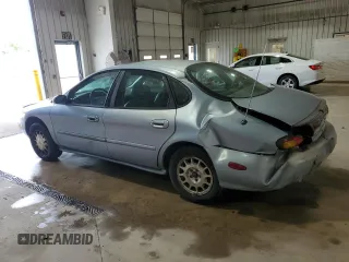 1997 Ford Taurus LX with VIN 1FALP53S8VA114239, listed as a Copart auction lot 56534025 with 110,834 mi miles and Salvage title. Bid and sale history available at DreamBid. Image 2.