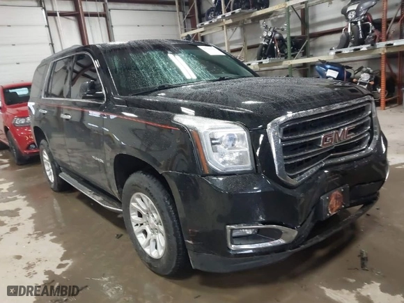 2017 GMC Yukon SLT with VIN 1GKS2BKC0HR147128, listed as a IAAI auction lot 41226119 with 147,557 mi miles. Bid and sale history available at carsss.com. Image 1.