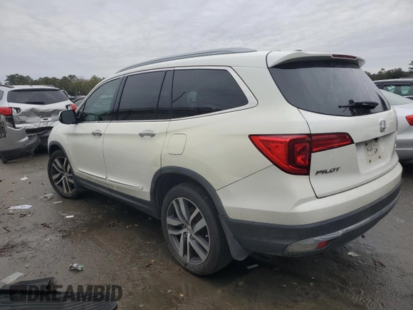 2017 Honda Pilot Touring with VIN 5FNYF6H99HB025600, listed as a Copart auction lot 88131475 with 131,939 mi miles and Salvage Title. Bid and sale history available at DreamBid. Image 2.