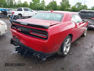 2016 Dodge Challenger R/T Plus z VIN 2C3CDZBT7GH300254, wystawiony jako IAAI lot #42289267 z przebiegiem 103 491 mil mil oraz . Historia ofert i sprzedaży dostępna na DreamBid. Obrazek 4.