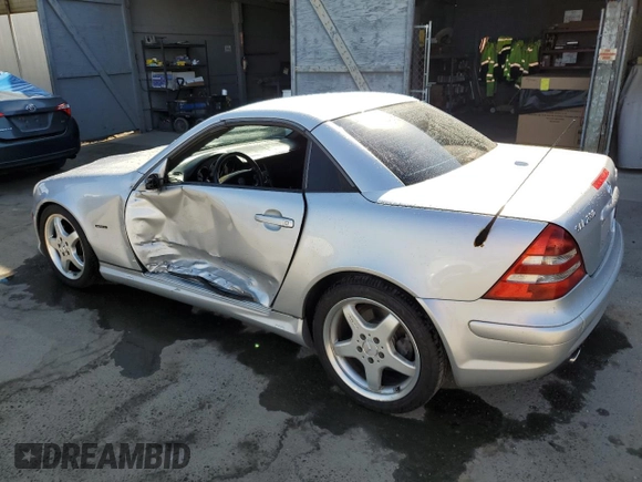 2002 Mercedes-Benz SLK-Class 2.3L Kompressor with VIN WDBKK49FX2F268683, listed as a Copart auction lot 68705174 with 132,677 mi miles and Salvage Title. Bid and sale history available at carsss.com. Image 2.