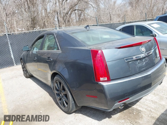 2009 Cadillac CTS RWD z VIN 1G6DF577790133127, wystawiony jako IAAI lot #41810358 z przebiegiem 220 278 mil mil oraz . Historia ofert i sprzedaży dostępna na DreamBid. Obrazek 3.