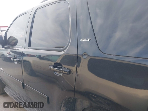2012 GMC Yukon SLT with VIN 1GKS2CE06CR150096, listed as a IAAI auction lot 41703820 with 308,958 mi miles. Bid and sale history available at carsss.com. Image 6.