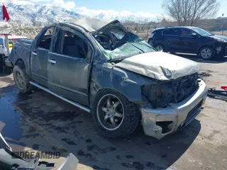 2004 Nissan Titan LE with VIN 1N6AA07B54N565729, listed as a IAAI auction lot 41813726 with 168,029 mi miles. Bid and sale history available at carsss.com. Image 1.