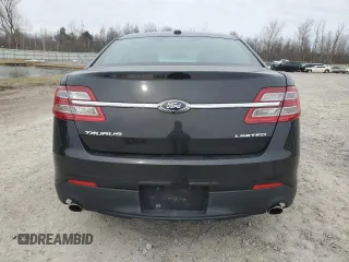 2013 Ford Taurus Limited with VIN 1FAHP2F89DG131731, listed as a Copart auction lot 48609065 with 116,975 mi miles and Salvage title. Bid and sale history available at DreamBid. Image 6.