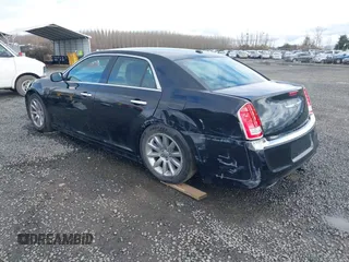 2012 Chrysler 300 Limited with VIN 2C3CCACG0CH263449, listed as a IAAI auction lot 41829134 with 157,108 mi miles. Bid and sale history available at carsss.com. Image 3.