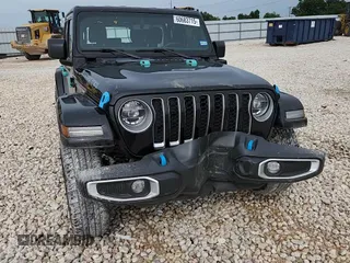 2022 Jeep Wrangler Unlimited Sahara with VIN 1C4JJXP61NW170425, listed as a Copart auction lot 60683715 with 51,847 mi miles and Salvage title. Bid and sale history available at DreamBid. Image 14.