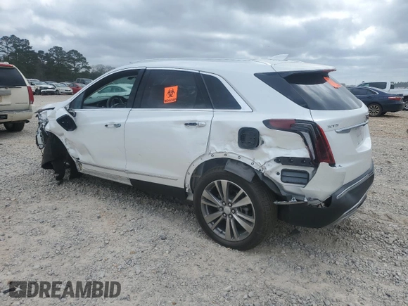 2022 Cadillac XT5 FWD Premium Luxury z VIN 1GYKNCRS5NZ174787, wystawiony jako Copart lot #47541075 z przebiegiem 31 357 mil mil oraz Szkoda całkowita • Salvage title. Historia ofert i sprzedaży dostępna na DreamBid. Obrazek 2.