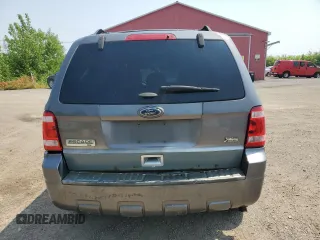 2012 Ford Escape XLT z VIN 1FMCU9DG8CKB35535, wystawiony jako Copart lot #60202675 z przebiegiem 205 750 mil mil oraz Szkoda całkowita • Salvage title. Historia ofert i sprzedaży dostępna na DreamBid. Obrazek 6.