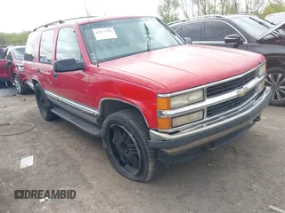 1997 Chevrolet Tahoe z VIN 1GNEK13R2VJ347452, wystawiony jako IAAI lot #42173299 z przebiegiem 261 924 mil mil oraz . Historia ofert i sprzedaży dostępna na DreamBid. Obrazek 1.