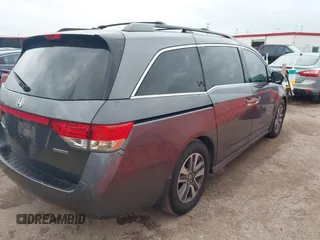 2016 Honda Odyssey Touring Elite with VIN 5FNRL5H96GB063176, listed as a IAAI auction lot 42157604 with 106,177 mi miles. Bid and sale history available at carsss.com. Image 4.
