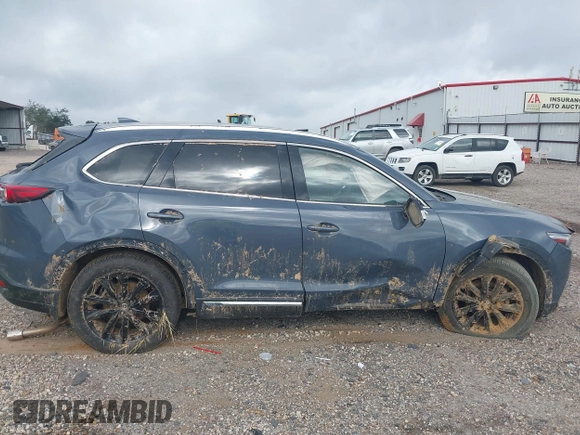 2021 Mazda CX-9 Grand Touring with VIN JM3TCADY2M0509286, listed as a IAAI auction lot 39976279 with 93,588 mi miles and . Bid and sale history available at DreamBid. Image 14.
