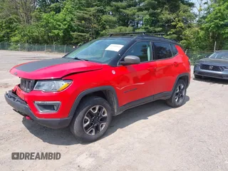 2018 Jeep Compass Trailhawk z VIN 3C4NJDDBXJT334496, wystawiony jako IAAI lot #42400835 z przebiegiem 188 896 mil mil oraz . Historia ofert i sprzedaży dostępna na DreamBid. Obrazek 2.