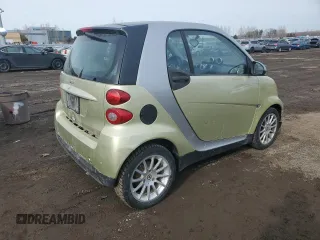 2009 Smart fortwo Pure z VIN WMEEJ31X49K292142, wystawiony jako Copart lot #48928535 z przebiegiem 226 263 mil mil oraz Tytuł czysty. Historia ofert i sprzedaży dostępna na DreamBid. Obrazek 3.
