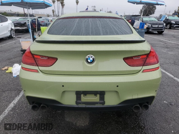 2013 BMW 6 Series 650i with VIN WBA6B2C59DDG66909, listed as a Copart auction lot 86329014 with 131,054 mi miles and Salvage Title. Bid and sale history available at DreamBid. Image 6.