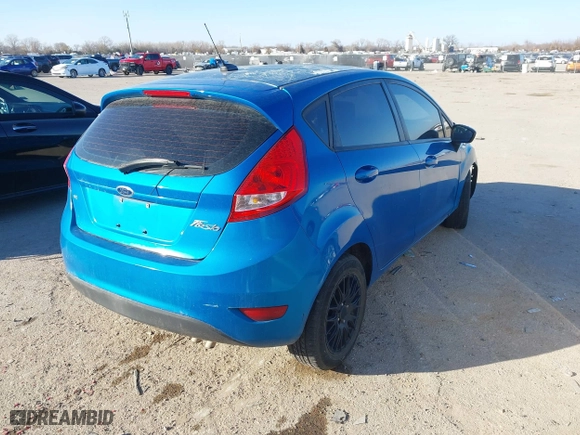 2012 Ford Fiesta SE with VIN 3FADP4EJ6CM131947, listed as a IAAI auction lot 41013636 with 148,195 mi miles. Bid and sale history available at carsss.com. Image 4.