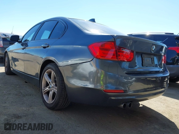2015 BMW 3 Series 328i with VIN WBA3C1C51FK123852, listed as a IAAI auction lot 41857179 with 90,308 mi miles and . Bid and sale history available at carsss.com. Image 3.