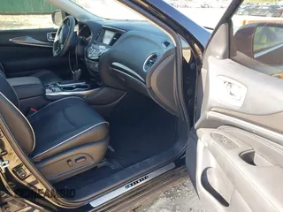 2020 Infiniti QX60 Pure with VIN 5N1DL0MN4LC539573, listed as a IAAI auction lot 42010032 with 104,507 mi miles and . Bid and sale history available at DreamBid. Image 5.