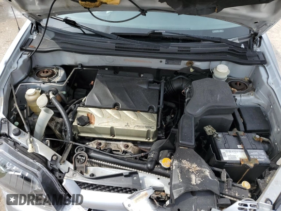 2004 Mitsubishi Outlander XLS z VIN JA4LX41F24U057392, wystawiony jako Copart lot #59284845 z przebiegiem 106 667 mil mil oraz Szkoda całkowita • Salvage title. Historia ofert i sprzedaży dostępna na DreamBid. Obrazek 12.