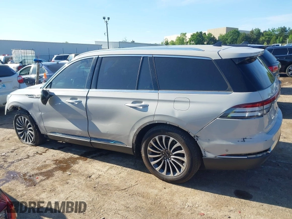 2021 Lincoln Aviator Reserve z VIN 5LM5J7WC6MGL12195, wystawiony jako IAAI lot #42159567 z przebiegiem 95 199 mil mil oraz . Historia ofert i sprzedaży dostępna na DreamBid. Obrazek 14.