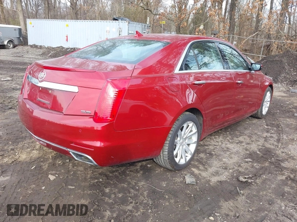2014 Cadillac CTS Luxury AWD with VIN 1G6AX5S38E0146872, listed as a IAAI auction lot 41663642 with 56,787 mi miles and . Bid and sale history available at DreamBid. Image 4.