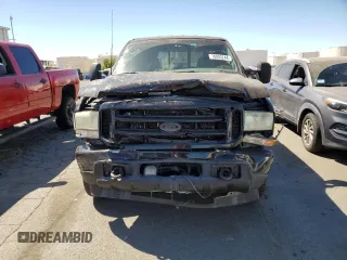 2003 Ford Super Duty F-250 XL with VIN 1FTNW21L93EB52407, listed as a Copart auction lot 70003244 with 460,149 mi miles and Salvage Title. Bid and sale history available at carsss.com. Image 5.