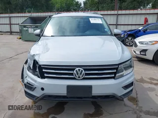 2018 Volkswagen Tiguan S with VIN 3VV1B7AX0JM092116, listed as a IAAI auction lot 42388339 with 103,412 mi miles and . Bid and sale history available at DreamBid. Image 12.