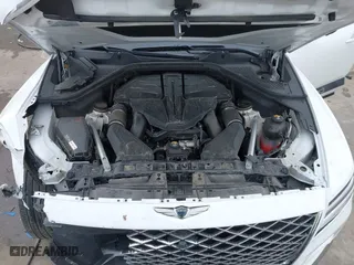 2023 Genesis GV80 with VIN KMUHCESCXPU114991, listed as a IAAI auction lot 41596019 with 31,787 mi miles. Bid and sale history available at carsss.com. Image 10.