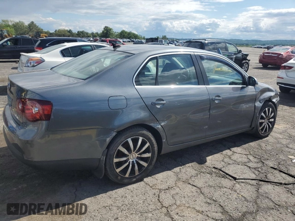 2009 Volkswagen Jetta SE with VIN 3VWRZ71K79M168084, listed as a Copart auction lot 57854825 with 150,986 mi miles and Salvage title. Bid and sale history available at DreamBid. Image 3.