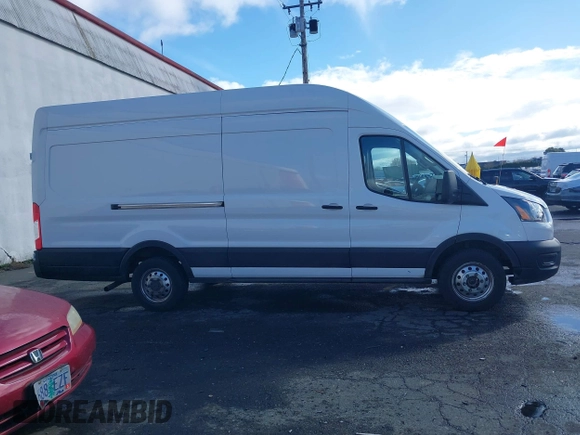 2023 Ford Transit Cargo with VIN 1FTBR3U88PKA07731, listed as a IAAI auction lot 41781986 with 37,044 mi miles and . Bid and sale history available at DreamBid. Image 13.