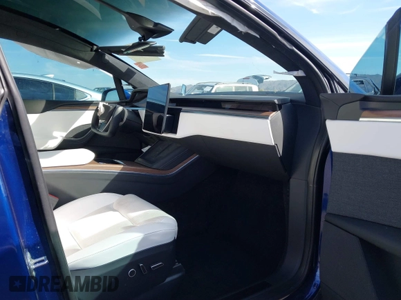 2022 Tesla Model X with VIN 7SAXCDE58NF341112, listed as a IAAI auction lot 41632491 with Not Provided miles and . Bid and sale history available at DreamBid. Image 5.