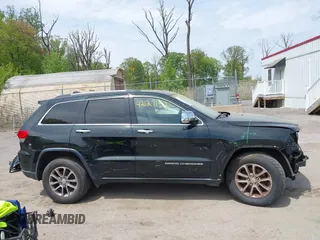 2014 Jeep Grand Cherokee Limited with VIN 1C4RJFBG3EC497939, listed as a IAAI auction lot 42127152 with 112,095 mi miles and . Bid and sale history available at DreamBid. Image 13.