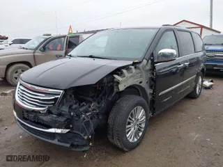 2013 Chrysler Town & Country Touring-L with VIN 2C4RC1CG8DR809559, listed as a IAAI auction lot 41468926 with 182,236 mi miles. Bid and sale history available at carsss.com. Image 2.