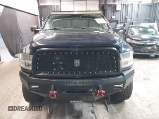 2013 Ram 2500 SLT z VIN 3C6TR5JT1DG566895, wystawiony jako IAAI lot #42096955 z przebiegiem 168 454 mil mil oraz . Historia ofert i sprzedaży dostępna na DreamBid. Obrazek 6.