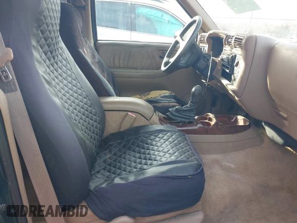 1997 Oldsmobile Bravada z VIN 1GHDT13W9V2705528, wystawiony jako IAAI lot #41583837 z przebiegiem 284 281 mil mil oraz . Historia ofert i sprzedaży dostępna na DreamBid. Obrazek 5.