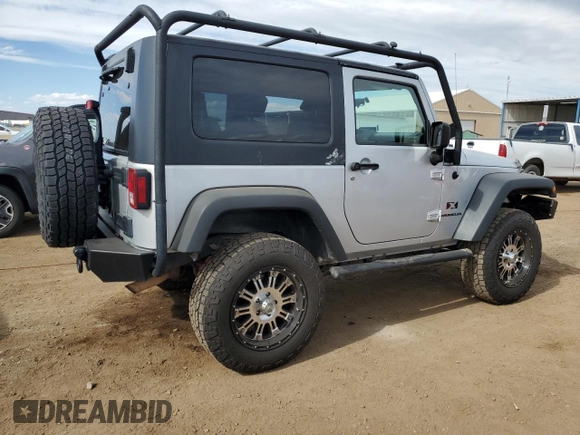 2009 Jeep Wrangler X with VIN 1J4FA24199L787574, listed as a Copart auction lot 58189835 with 74,331 mi miles and Salvage title. Bid and sale history available at DreamBid. Image 3.