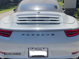 2014 Porsche 911 Carrera z VIN WP0CA2A92ES140453, wystawiony jako IAAI lot #42302853 z przebiegiem 47 879 mil mil oraz . Historia ofert i sprzedaży dostępna na DreamBid. Obrazek 8.
