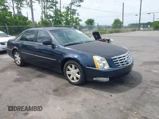 2006 Cadillac DTS w/1SC with VIN 1G6KD57Y06U191087, listed as a IAAI auction lot 42078599 with 142,202 mi miles. Bid and sale history available at carsss.com. Image 1.