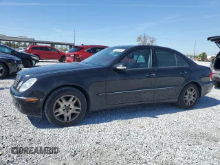2005 Mercedes-Benz E-Class 3.2L with VIN WDBUF65JX5A617085, listed as a Copart auction lot 46525065 with 147,874 mi miles and Salvage Title. Bid and sale history available at carsss.com. Image 1.