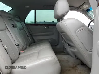 2007 Cadillac DTS V8 z VIN 1G6KD57Y27U179010, wystawiony jako Copart lot #54055605 z przebiegiem 137 326 mil mil oraz Szkoda całkowita • Salvage title. Historia ofert i sprzedaży dostępna na DreamBid. Obrazek 10.