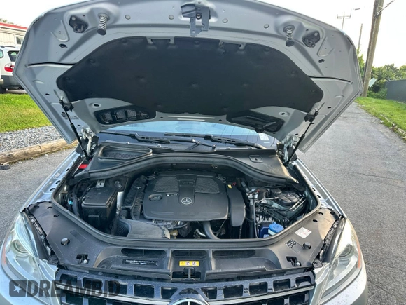 2014 Mercedes-Benz M 350 with VIN 4JGDA5JB3EA372327, listed as a Copart auction lot 63948025 with 71,418 mi miles and Clean title. Bid and sale history available at DreamBid. Image 7.