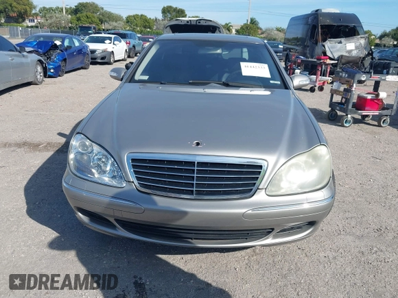 2004 Mercedes-Benz S-Class 4.3L with VIN WDBNG83J14A406775, listed as a IAAI auction lot 41442333 with 77,463 mi miles. Bid and sale history available at carsss.com. Image 6.