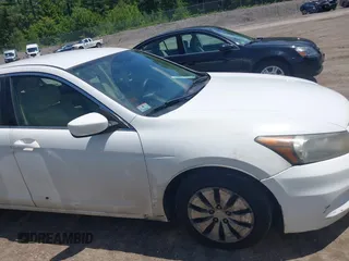 2011 Honda Accord LX with VIN 1HGCP2F33BA011935, listed as a IAAI auction lot 42556687 with 293,722 mi miles and . Bid and sale history available at DreamBid. Image 6.