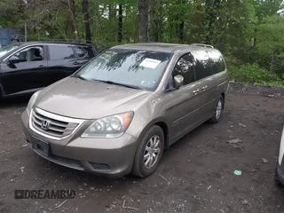 2009 Honda Odyssey EX-L with VIN 5FNRL38759B022866, listed as a IAAI auction lot 42200965 with 145,641 mi miles and . Bid and sale history available at DreamBid. Image 2.